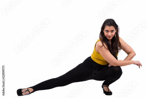 Full body shot of young beautiful Indian woman posing down on th