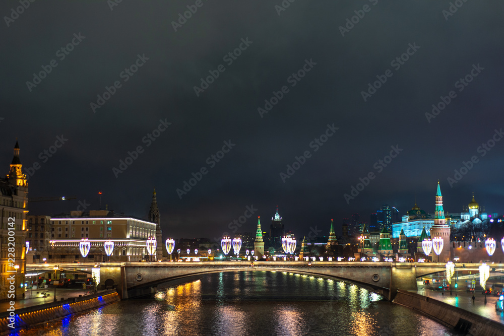 Night view of the Moscow Kremlin and Moskvoretskaya embankment with New year illumination, Moscow, Russia