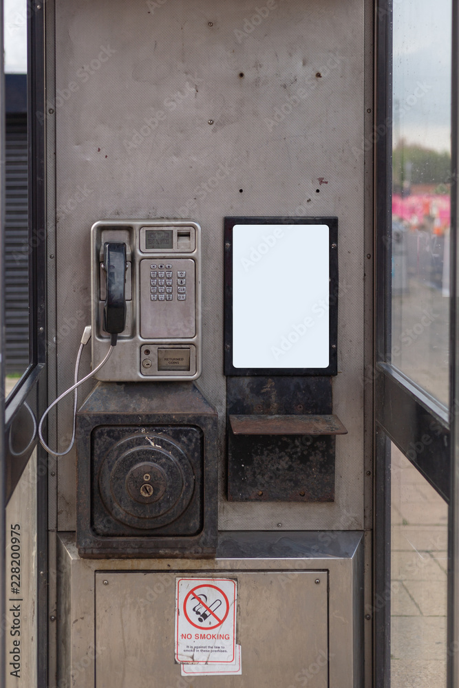 Old telephone booth. White place for advertising. Old telephone booth. White place for advertising.
