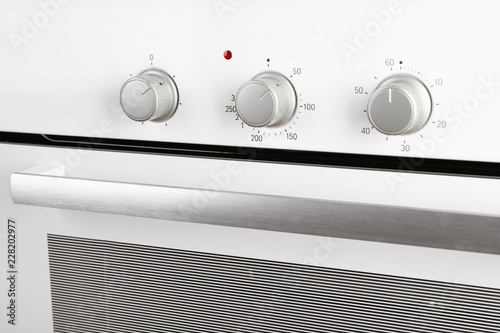 Modern electric oven, closeup view. Kitchen appliance