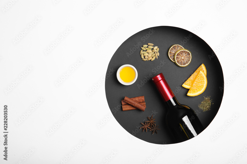 Composition with ingredients for mulled wine on white background, top view. Space for text Composition with ingredients for mulled wine on white background, top view. Space for text