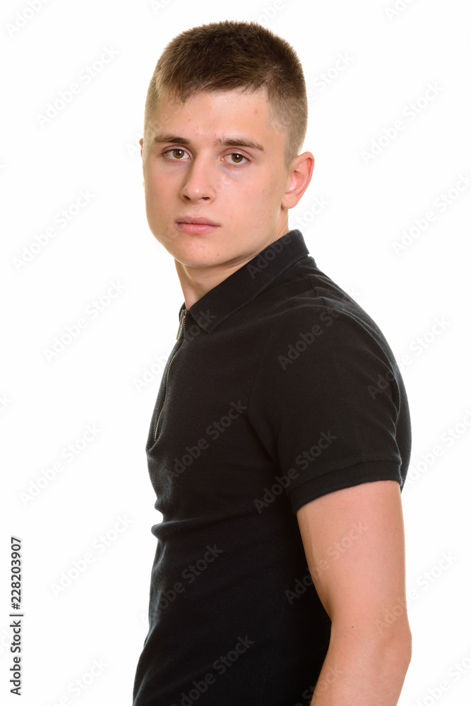 Young confident Caucasian man looking at camera Young confident Caucasian man looking at camera