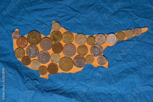 Konstfotografi International coins on cutted out of paper Cyprus island