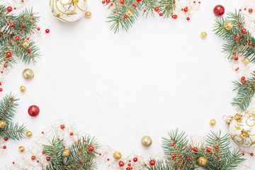 Bright Christmas frame, red and gold christmas decorations on white background. Copy space. Winter holidays, New Year.