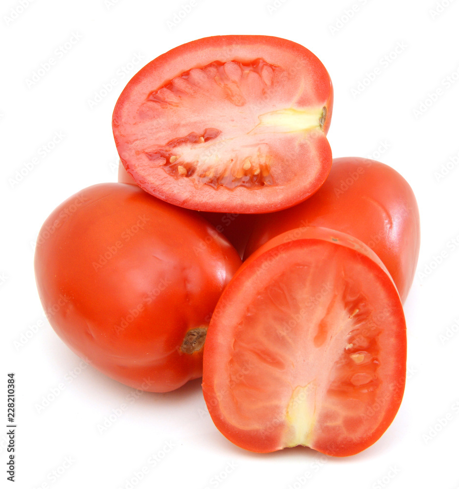 Fresh tomatoes isolated on white