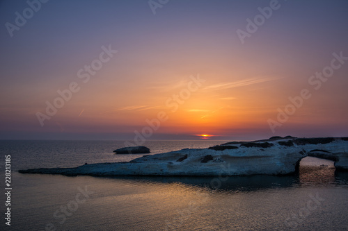 Limestone rock with arch  S Archittu di Santa Caterina in Oristano Province  Sardinia  Italy captured in summer at sunset.