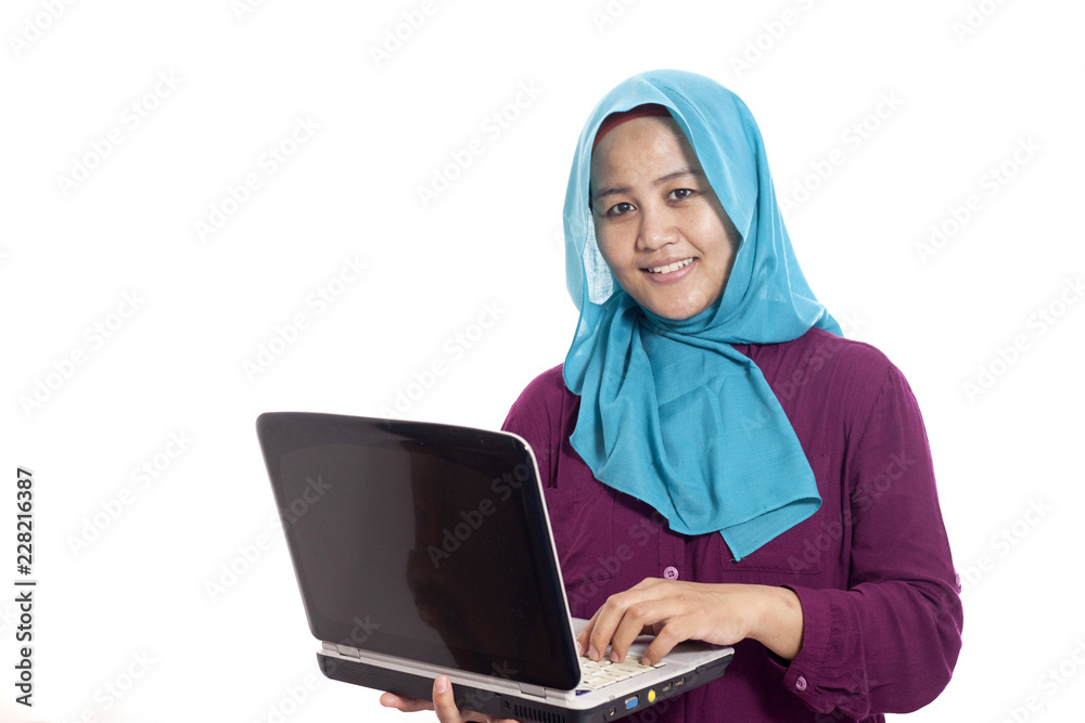 Happy Successful Muslim Businesswoman with Laptop