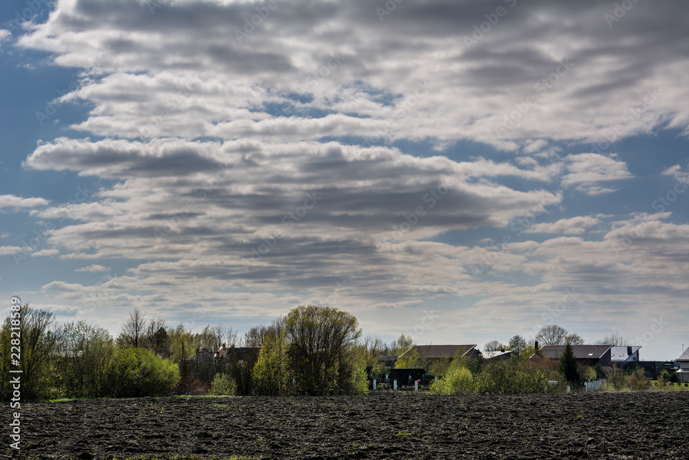 Countryside landscape of ploughed field in spring, in Lithuania.