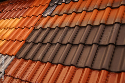 Glossy, matte and textured surface. Different colored roof tiles.