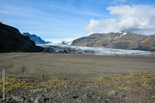 Rocky scene to Skaftafellsjokull glacier, in Skaftafell, Iceland in summer