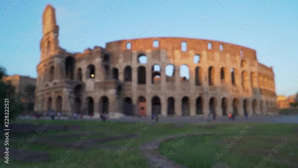 Full out of focus view of Roman Colosseum at sunset in Rome Italy Full out of focus view of Roman Colosseum at sunset in Rome Italy