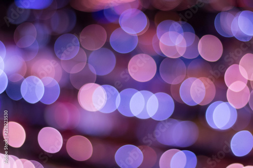 Abstract background city lights at night. Street light night market blur color bokeh background.