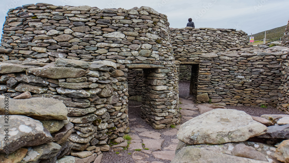 ancient beehive Irish huts  formed in stone cashels or enclosed farmsteads in the Early Christian Period