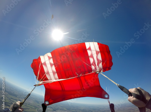 First person view of a red parachute