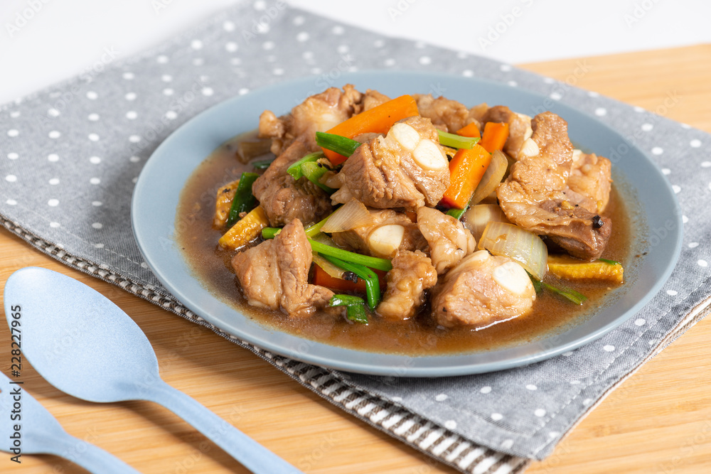 Pork spare rib stir fried with soy sauce and black pepper Pork spare rib stir fried with soy sauce and black pepper