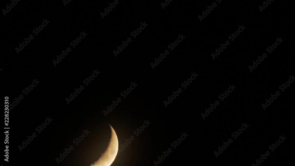 Moon photographed through a telescope with some atmospheric turbulence. 