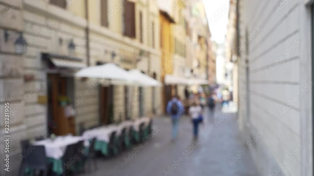 Street alley scene with outdoor cafe in in old European city Street alley scene with outdoor cafe in in old European city