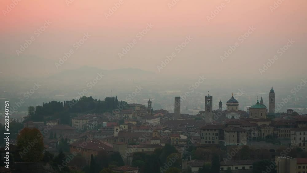 Bergamo. One of the beautiful city in Italy. Morning landscape at the old town from Saint Vigilio hill during fall season Bergamo. One of the beautiful city in Italy. Morning landscape at the old town from Saint Vigilio hill during fall season