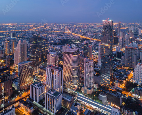 Aerial view of Chong Nonsi, Sathorn, Bangkok Downtown. Financial district and business centers in smart urban city in Asia. Skyscraper and high-rise buildings at night. photo