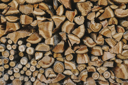 Photo Stack of firewood textured background