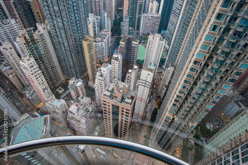 Photography View from a glass elevator above the city and scyscrapers, vertigo inducing view