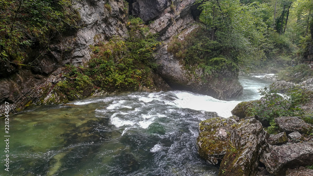 View of canyon Blejski Vintgar with beautiful clear and speed water. Canyon is near the Bled lake in Slovenia.