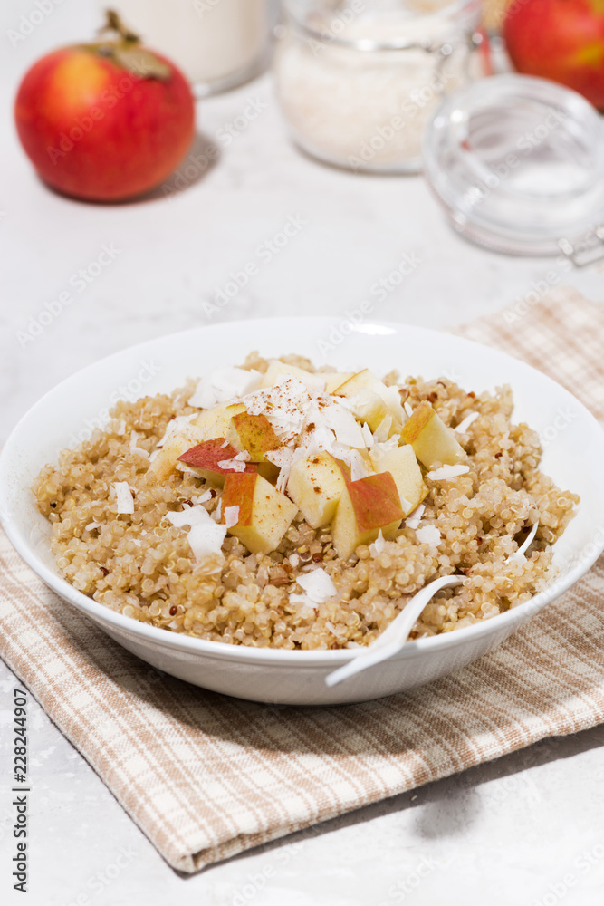 healthy breakfast quinoa with apple and coconut, vertical healthy breakfast quinoa with apple and coconut, vertical