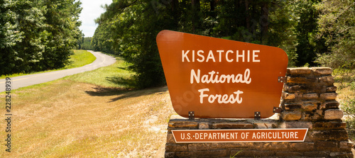 Sign Marking the Boundary of Kisatchie National Forest Protected Land in Louisiana photo