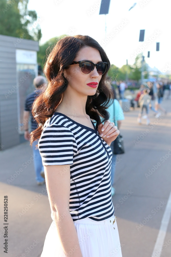 Outdoors portrait of beautiful woman in glasses Outdoors portrait of beautiful woman in glasses
