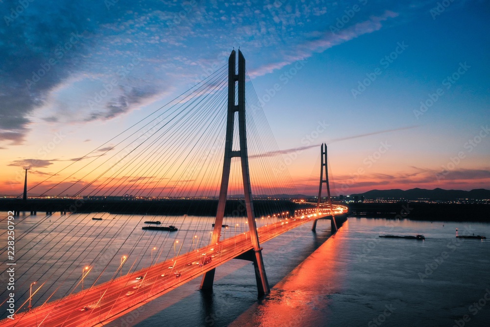 Obraz premium Sunset at The Third Nanjing Yangtze River Bridge Seen From A Drone