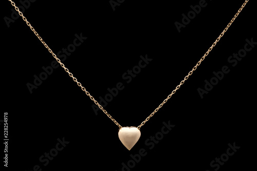 Golden necklace on a black background