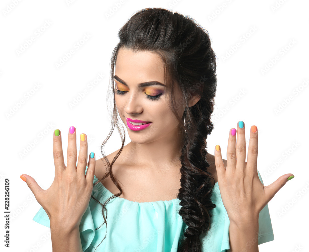 Beautiful young woman with colorful manicure on white background Beautiful young woman with colorful manicure on white background