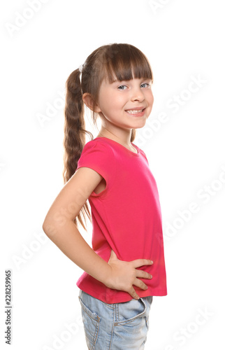 Little girl in t-shirt on w...