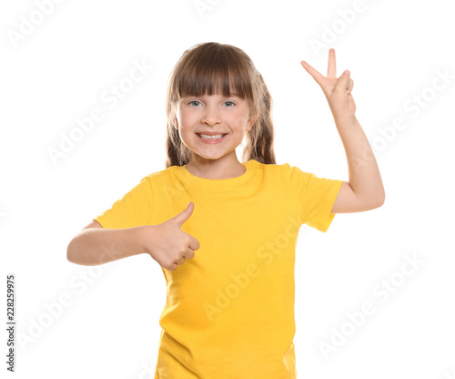 Little girl in t-shirt show...