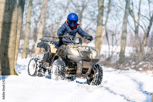 Travel in the winter on the ATV. Beautiful winter nature.