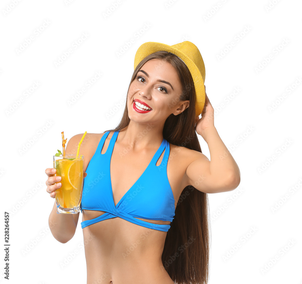 Beautiful woman in swimming suit and with tasty summer cocktail on white background Beautiful woman in swimming suit and with tasty summer cocktail on white background