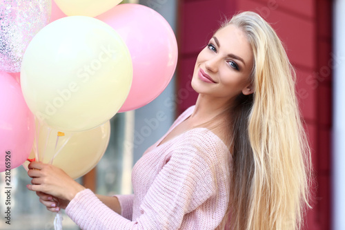 Beautiful young woman with ...