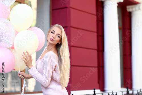 Beautiful young woman with ...