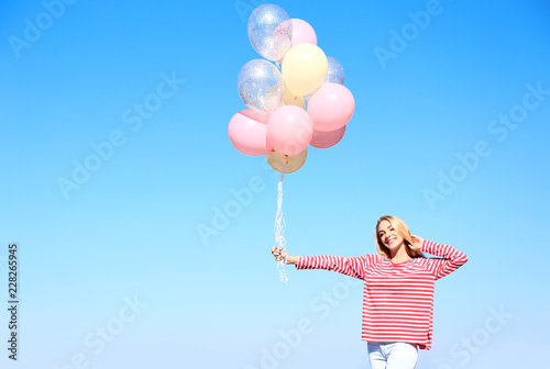 Beautiful young woman with ...