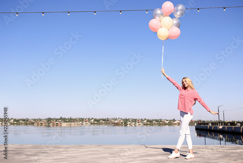 Beautiful young woman with ...