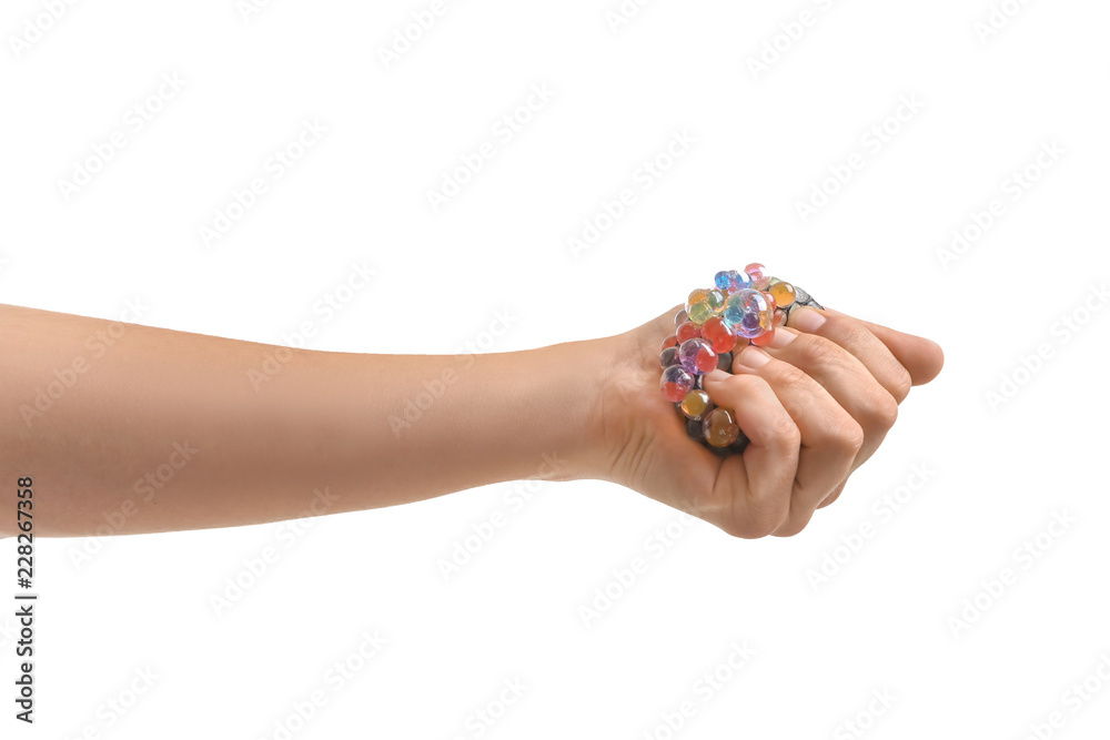 Man squeezing stress ball on white background Man squeezing stress ball on white background
