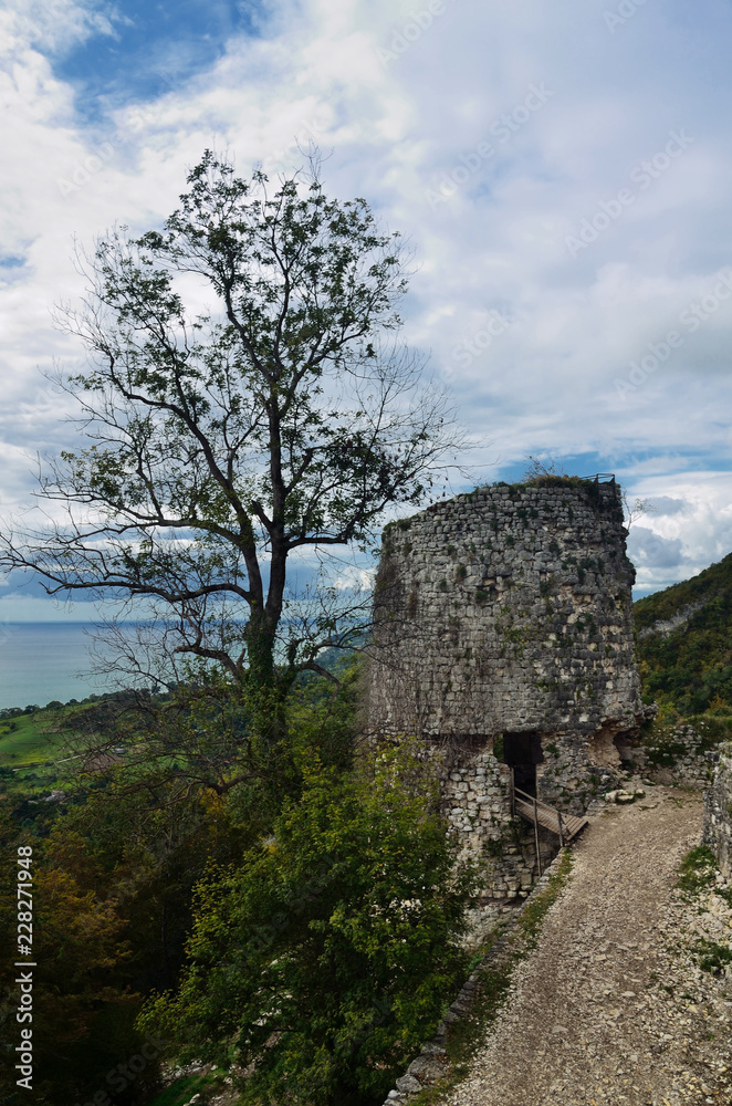 The remains of an ancient observation tower in the mountains.