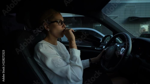 Wallpaper Mural Depressed woman drinking wine while driving car, risk of accident dangerous trip Torontodigital.ca