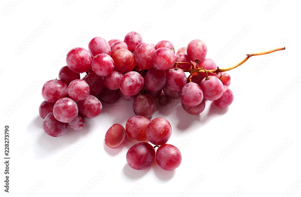 Ripe grapes on white background