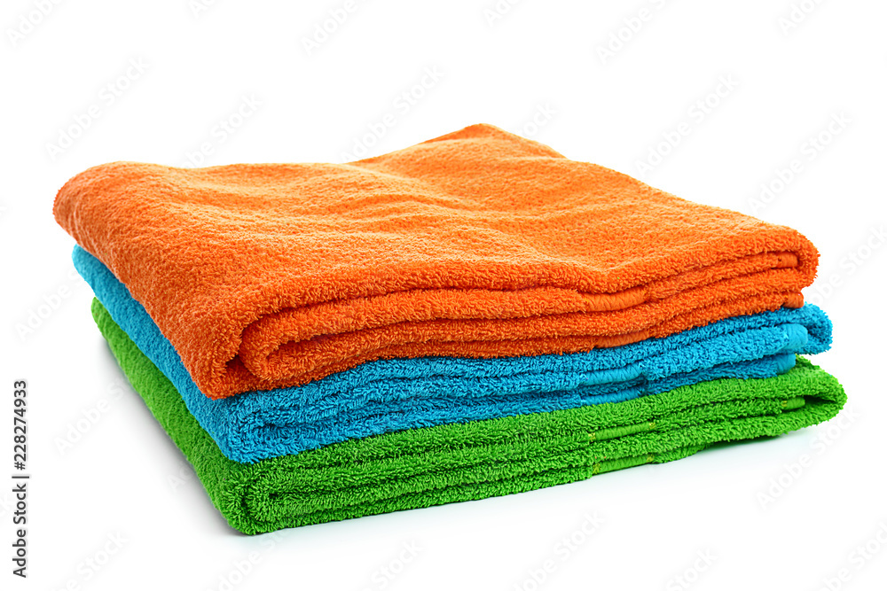 Stack of bright soft towels on white background Stack of bright soft towels on white background