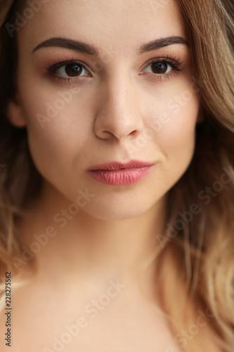 Portrait of beautiful young woman, closeup