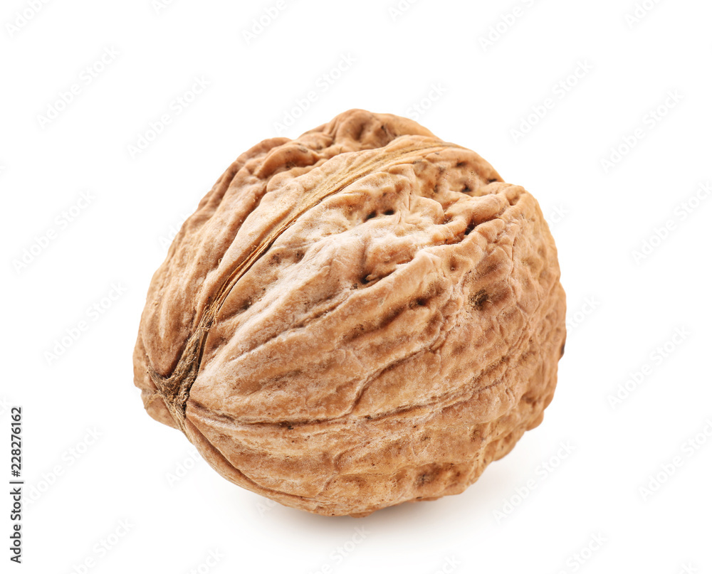 Unpeeled walnut on white background Unpeeled walnut on white background