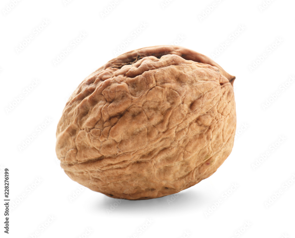 Unpeeled walnut on white background Unpeeled walnut on white background
