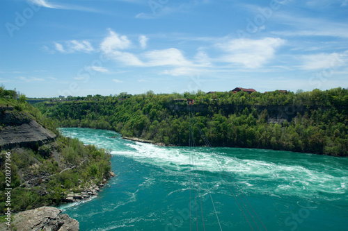 Wallpaper Mural NIAGARA FALLS, ONTARIO, CANADA - MAY 21st 2018: Whirlpool Aero car carrying riders across the Niagara Whirlpool Torontodigital.ca