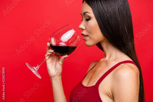Close up portrait of close eyes person lady with beverage in han